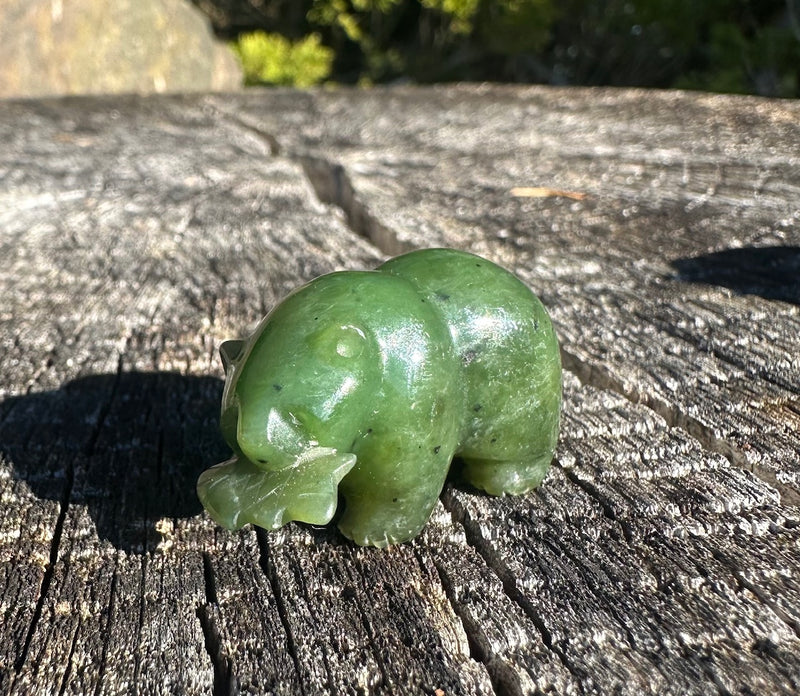 1.5" Bear with fish - Measured in length.
