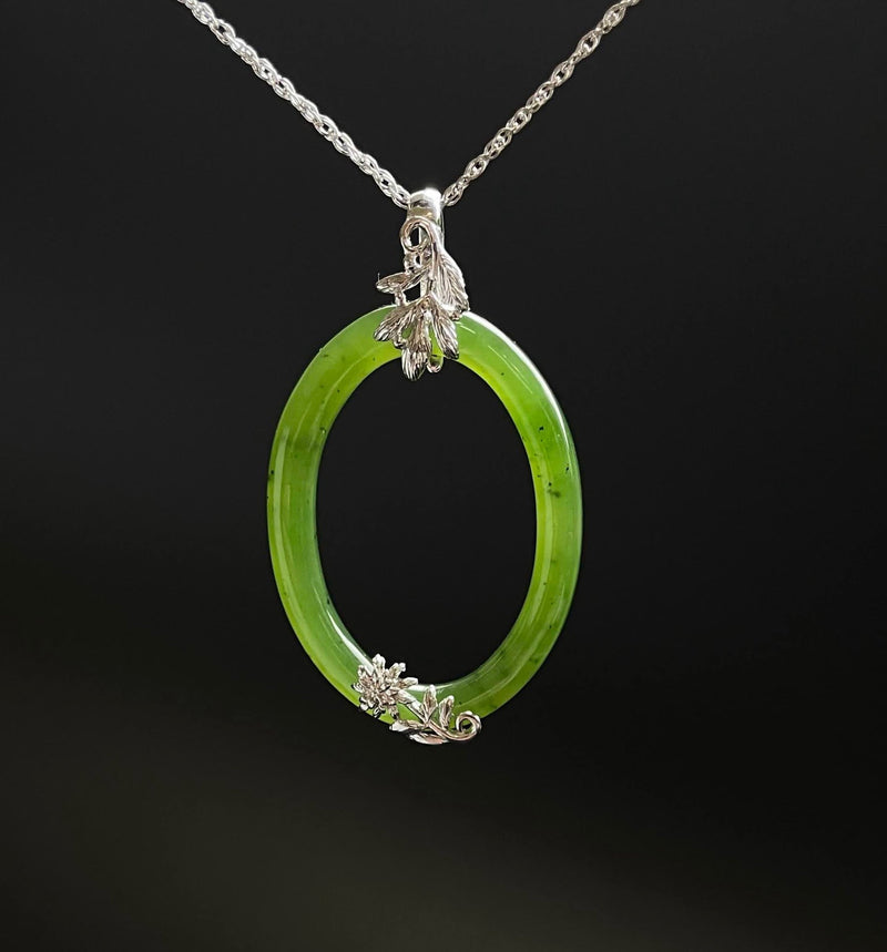 Oval Jade Pendant with Silver Leaves
