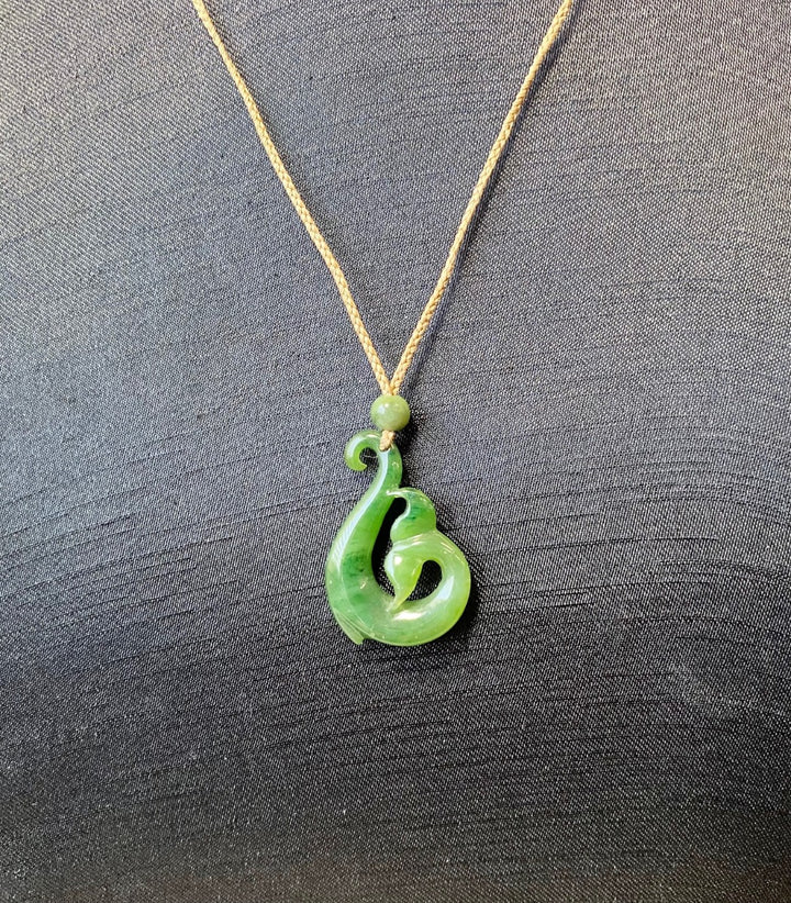 Fish jade pendant hotsell