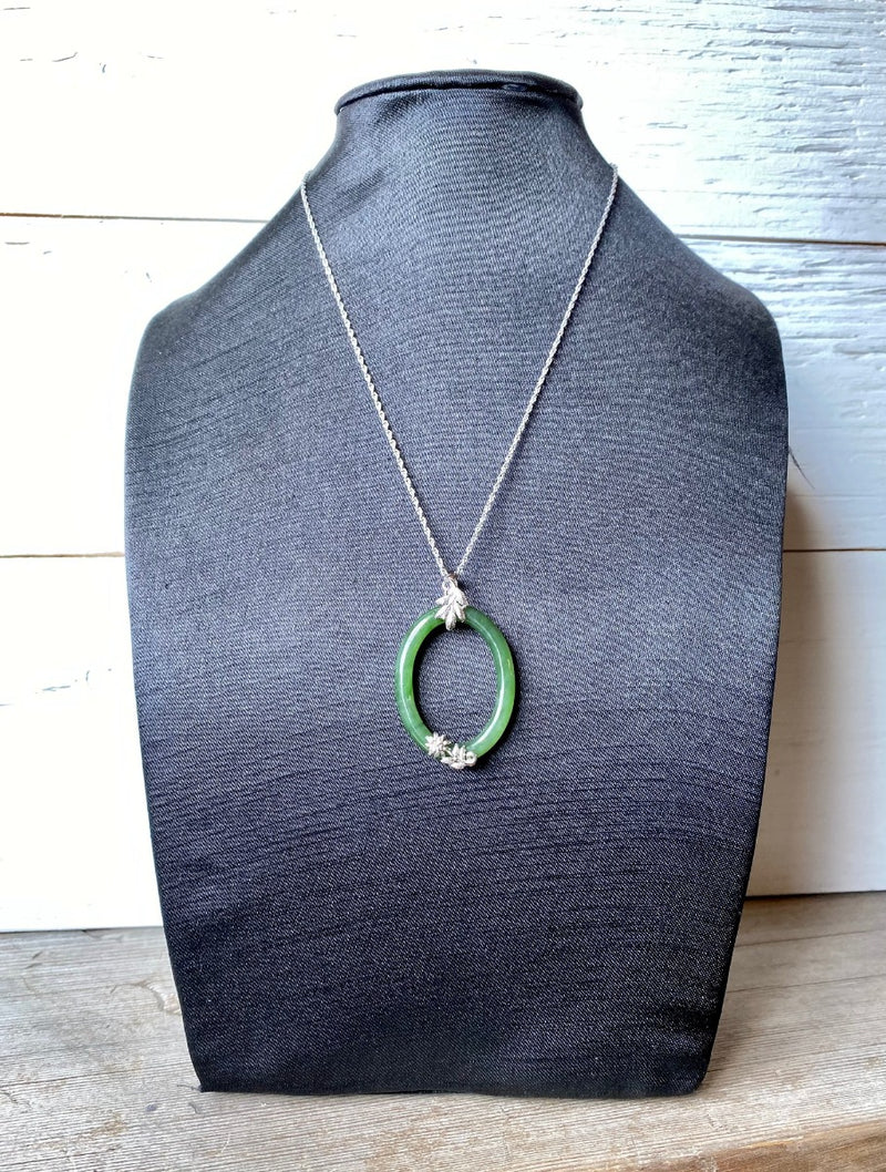 Oval Jade Pendant with Silver Leaves